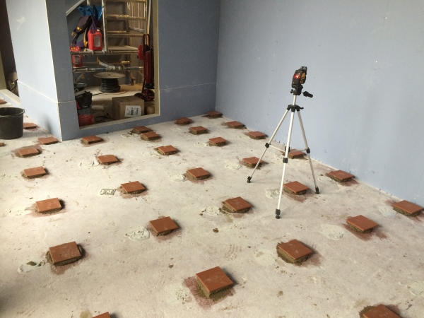Isolator locations being Levelled by Laser